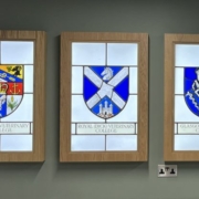 Crests of veterinary colleges rendered in stained glass